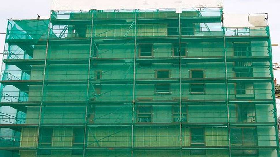  Do You Know Why Buildings Under Construction Are Covered With Green Cloth-TeluguStop.com